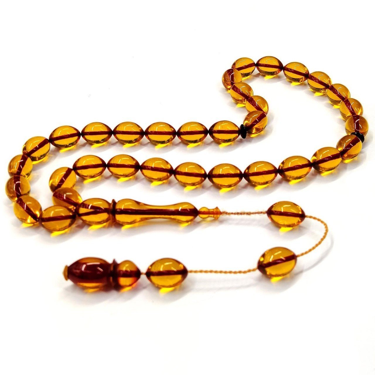 Sistemli Püsküllü Beyzi Kesim Şeffaf Turuncu Renk Ateş Kehribar Tesbih